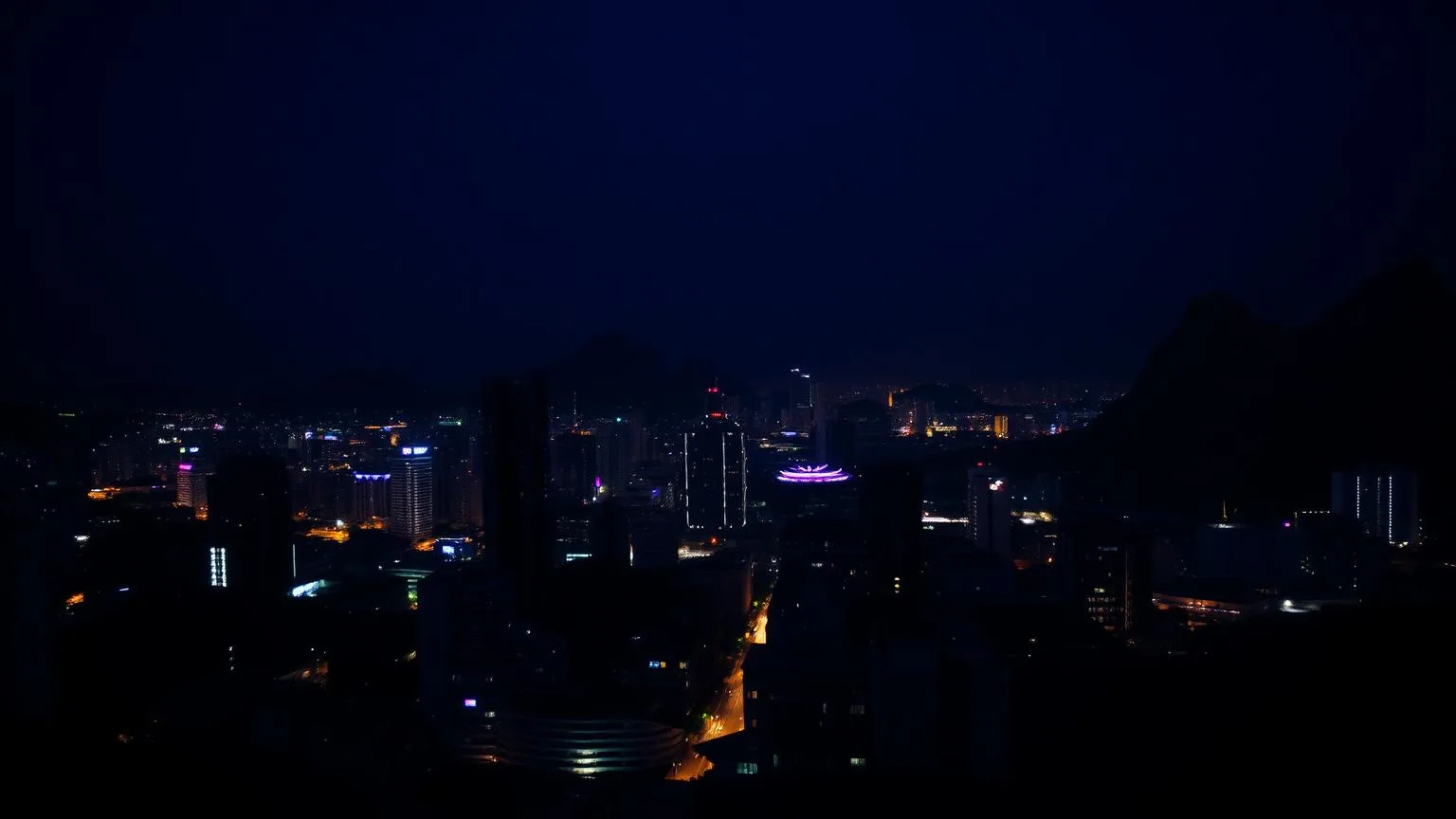 Vista noturna do Rio de Janeiro a partir de um edifício corporativo